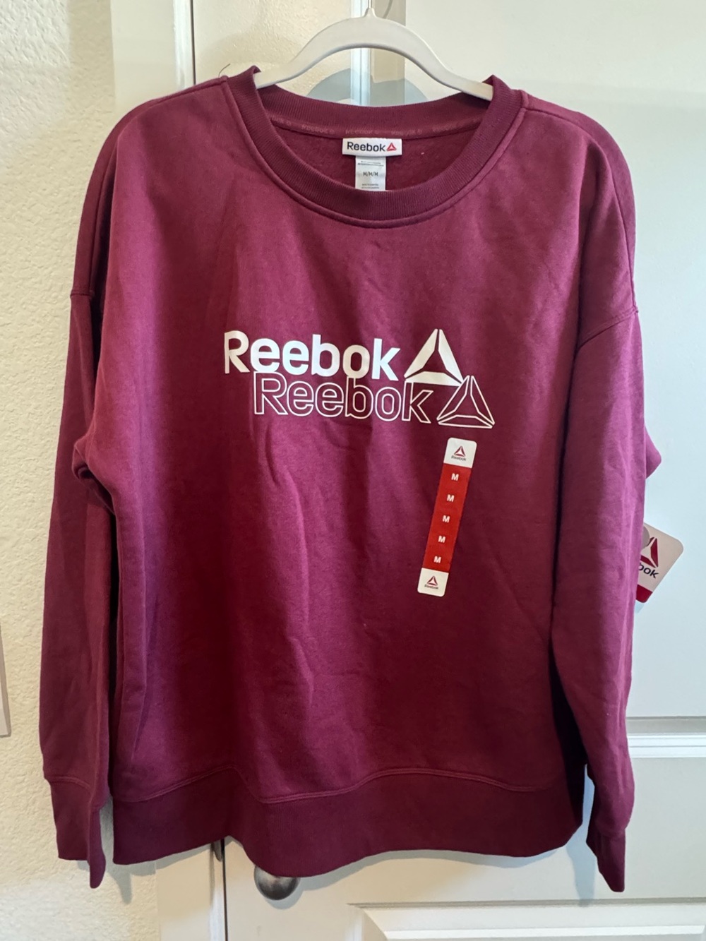 NWT Reebok Women’s Raspberry Relaxed Fit Crewneck Sweatshirt with Logo